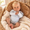 Léon, bébé reborn garçon 50 cm aux cheveux blond doré