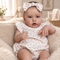 Margot, bébé reborn éveillée 55 cm, en tenue rose